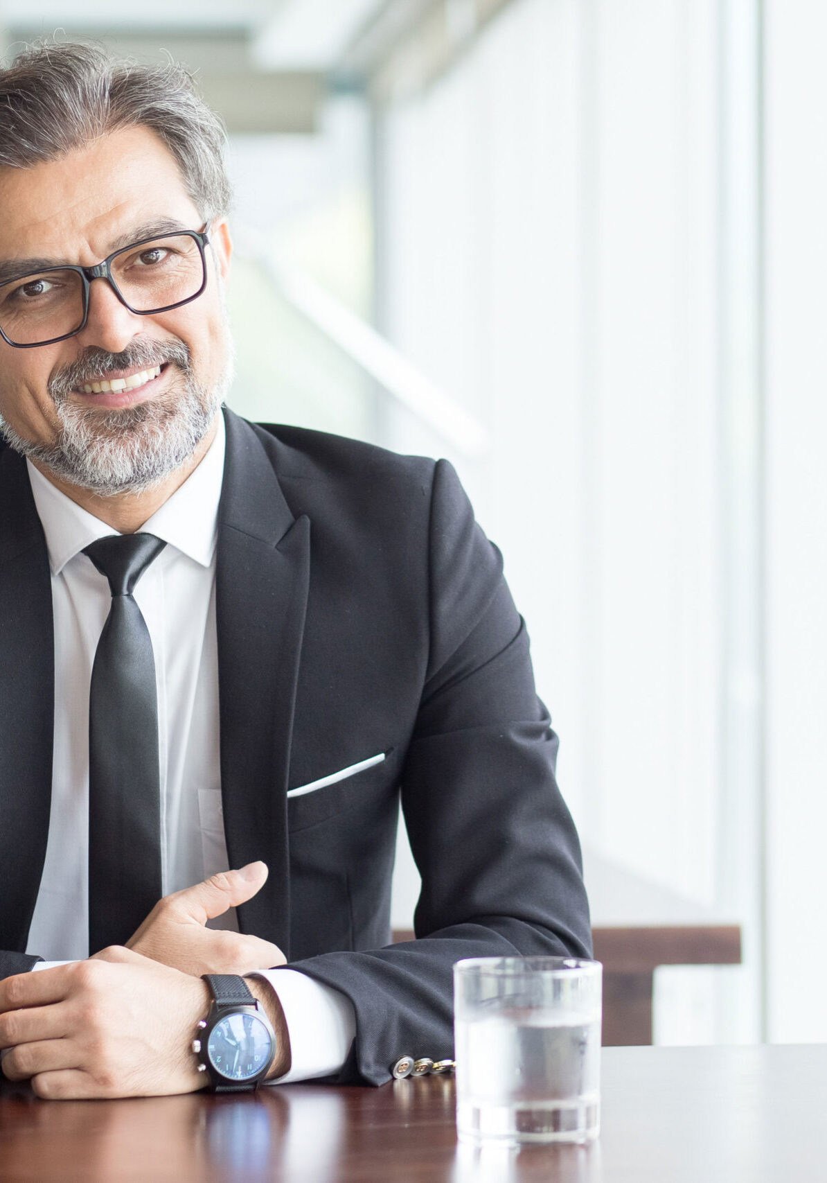 cheerful-businessman-eyeglasses-office